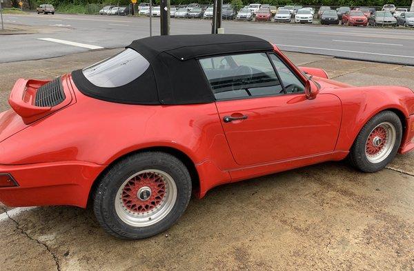 New convertible top on custom wide body Porsche