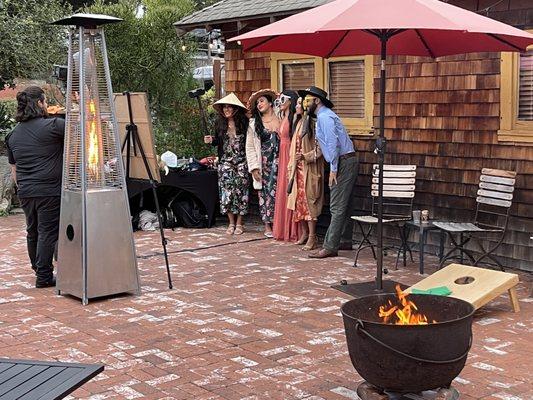 Enjoying the fire and photo booth on our Wave Street level.