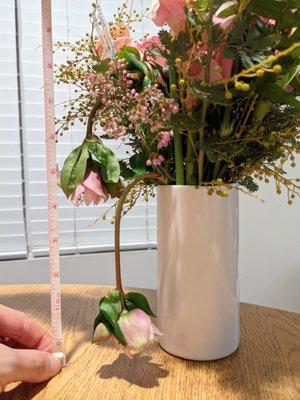 Two of the flowers were droopy on delivery. Picture taken on delivery day. Disappointing. Sweetheart Arrangement ($91.38 total cost).