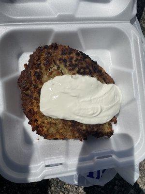 Potato latke with sour cream