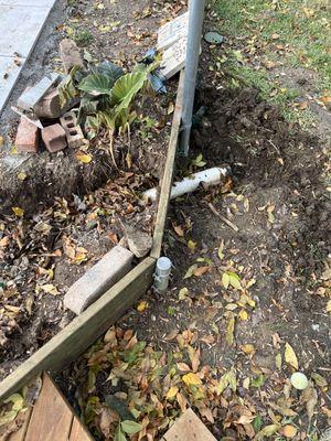 This pipe is where all the drains in pool deck drain to. It's aiming towards a tree so I have had to come up with a solution to this.