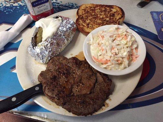 $9.95 rib eye dinner with 2 sides.