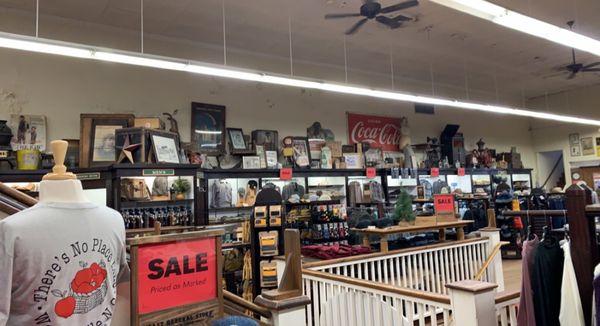 Antiques lined the upper shelves