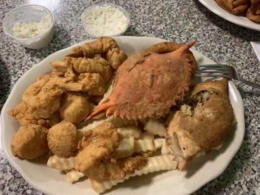 Fried scallops, jumbo shrimp, crab with coleslaw, hush puppies, French fries