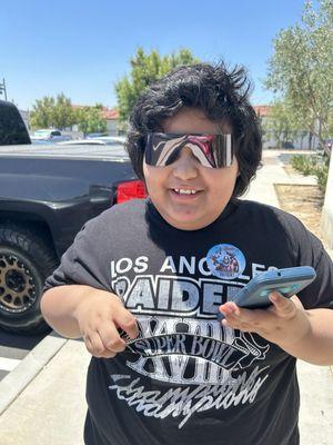 This little monster had his eyes dilated, he was excited to wear these sunglasses.