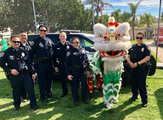 San Diego Women and Men in blue supporting the Tet Festival.