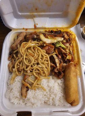 Hot spicy chicken teriyaki and a side of noodles with a spring roll