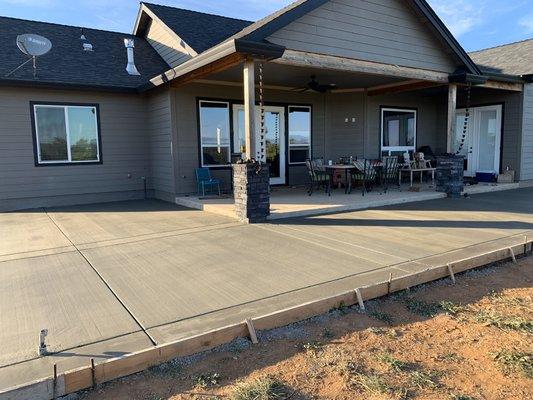 Backyard concrete slab addition.