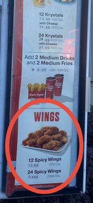 Twelve wings listed for $17.99 on multiple locations on the drive-thru menu.