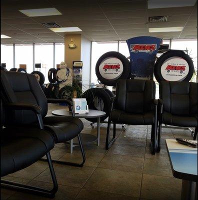 Hang out in the waiting room while your vehicle is getting an oil change, brake repair, wheel alignment, or any other repair.