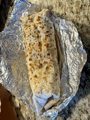 Beef burrito, pico de gallo, onions, cilantro, fresh squeezed lime and a line of green salsa from the salsa bar.