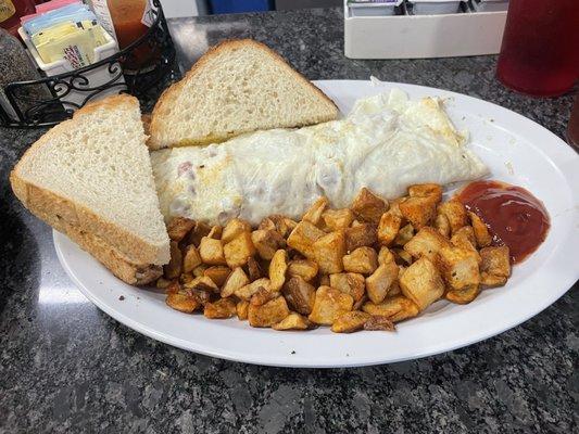 Veggie omelette. Home fries. Sourdough toast.