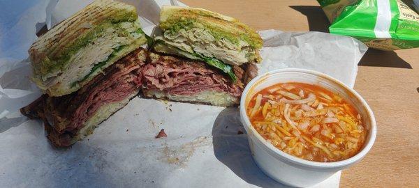 Turkey Pesto  on top and a Pastrami Reuben on bottom w/ Chili