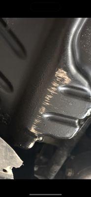 Missing under plate guard, dented oil pan