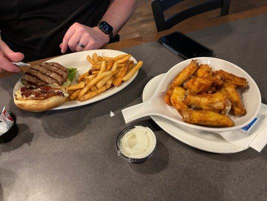 .50 wings during games. Burger is big and juicy.