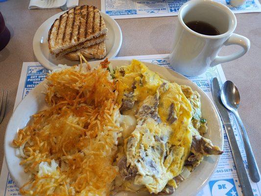 Roast Beef Omelette with hash browns, rye toast and hot tea.