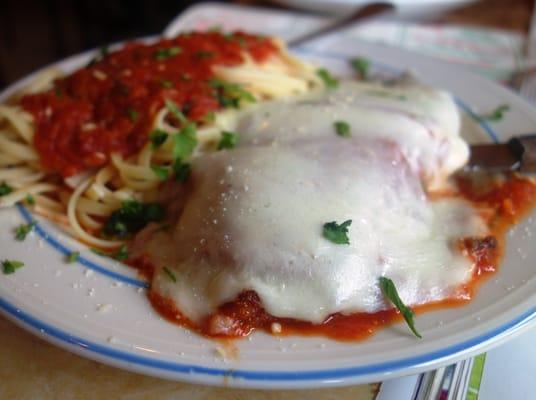 They certainly don't skimp on the cheese when it comes to chicken parm.