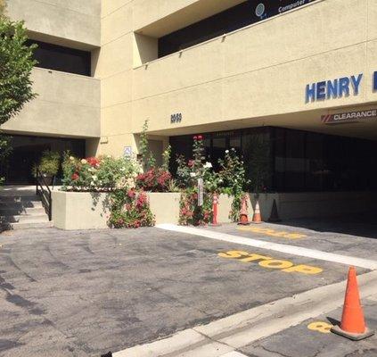 Henry Radio is located on the second floor with an elevator only at the front entrance up these steps and through the door on the right