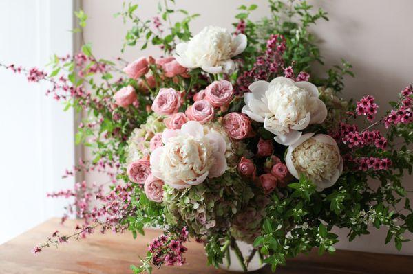 A Showstopper ($350) arrangement in pinks, cream and green.