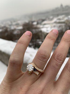 My beautiful engagement ring custom designed by Alex, with my grandma's sapphire, sparkling against the snowy castles in Budapest!