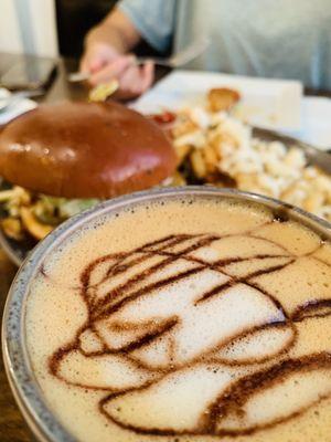 Yummy Vanilla latte + Buffalo sandwich and truffle fries.