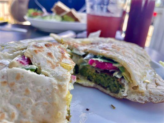 Mouth watering flavors.  Falafel Arabi Sandwich.