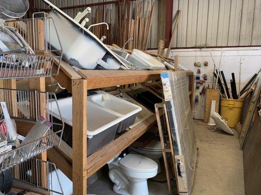 Sinks, toilets, bathtubs, tile and plumbing parts.