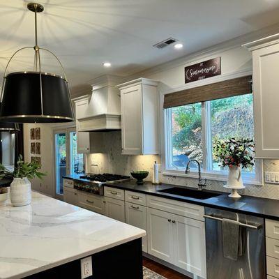 Quartz Countertop Island with Black Honed Granite Countertops