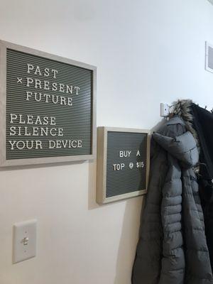 Coat area and some signs