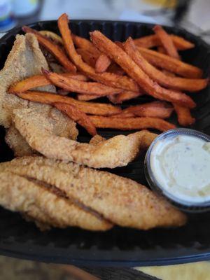 3 catfish fillets,  sweet potato fries,  tarter sauce and a slice of lemon