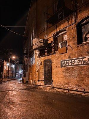 Alley way with Cafe Roka  sign