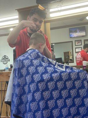 Son getting his haircut