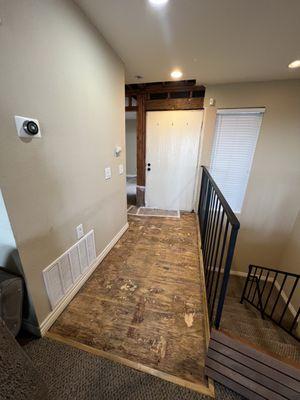 The drywall and flooring that had to be ripped up after the water damage