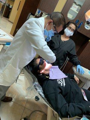 Dr. Victor Rosales extracting my daughter's 4 wisdom teeth in one sitting.