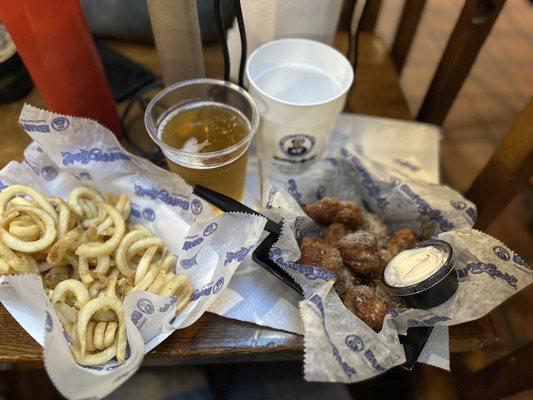 Fries, boneless wings and beer pint with complimentary cup