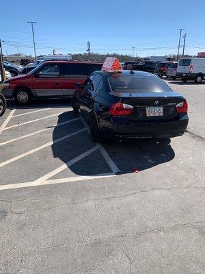 The car in the handicapped space.