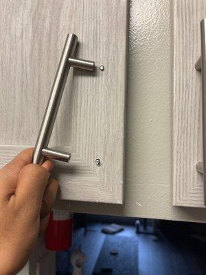 The infamous cabinet handle that has been "fixed" three times by maintenance since move in a few months ago yet is still broken lol.