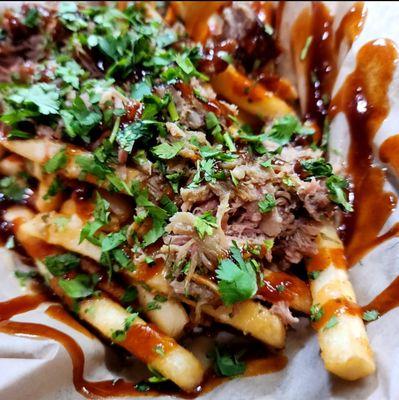 Huli Huli Fries - premium fries, pulled house-smoked pork, Huli Huli Hawaiian BBQ sauce and cilantro