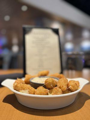 Cheese Curds @ a great happy hour. Delicious dip came with them. Cooked perfect