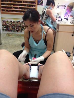 Doing my pedicure! She was really fast and good.