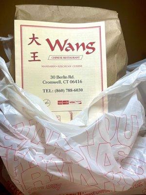 Take out order & menu - well packed and bag securely stapled shut - no spills & extra fortune cookies :p