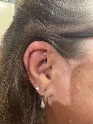 Rook piercing done June 2, 2023. Upper lobe was also done at same place.