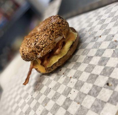 Hand crafted breakfast sandwiches! Egg, bacon, cheddar with cream cheese on a toasted everything bagel!