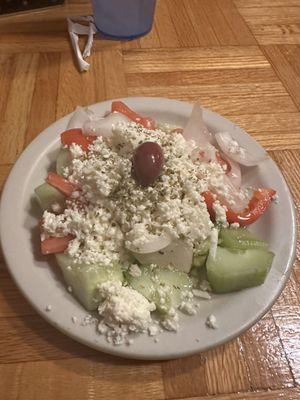 Greek side salad - delicious!  The feta was so mild; salad was flavored perfectly with spices and oil