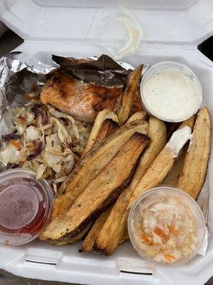 Grilled salmon with cabbage and garlic potato wedges