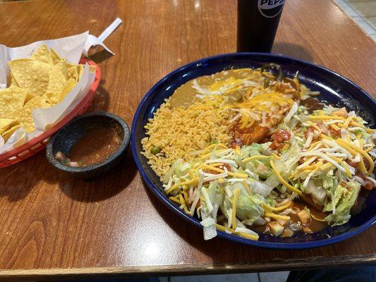 Three item grande plate with chimichanga, flauta, and chile relleno.