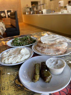 Garlic Paste  Tabula Salad Pitas  and grape leaves