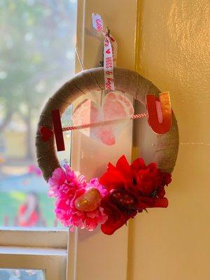 DIY craft: foam wreath, floral ribbon, fake flowers, ribbon, straw