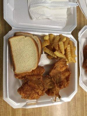 Fried catfish with bread and fries