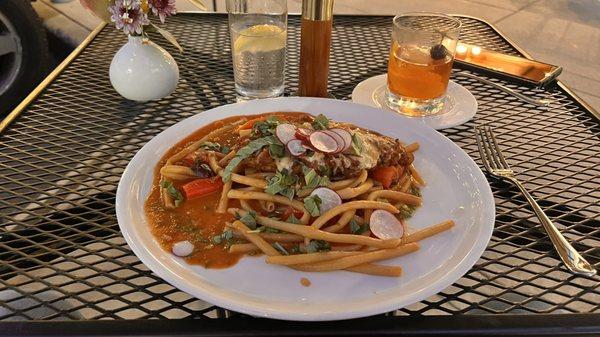 Chicken Parmesan with Bucitini in house and  homemade pasta